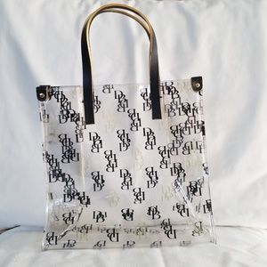Dooney and Bourke clear, black and gold tote
